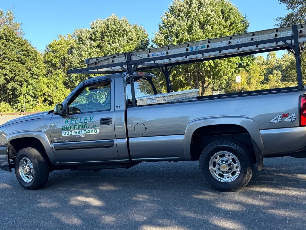 Kelley Roofing branded Chevy 2500 HD service truck serving New Haven County since 1986